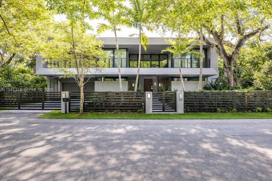 Stunning Coconut Grove home, featuring soaring ceilings and an abundance of natural light, the home was designed with high-end finishes and equipped with top-of-the-line appliances. The spacious layout includes two bedrooms on the main floor, a movie theater, expansive living and dining areas, and fully retractable doors that seamlessly connect the indoor and outdoor spaces. Upstairs, four additional bedrooms, including the lavish master suite, and another living room. The backyard is beautifully landscaped, with a serene pool surrounded by bamboo trees, creating a private oasis. Additional amenities include maid’s quarters and a two-car garage, plus 2 carport. The house is fully powered by solar panels and has 2 electric car plugs. Steps from Kennedy Park and 15 min walk to the center of the Grove. Truly the best lifestyle Miami has to offer. Quiet street with ample street parking.