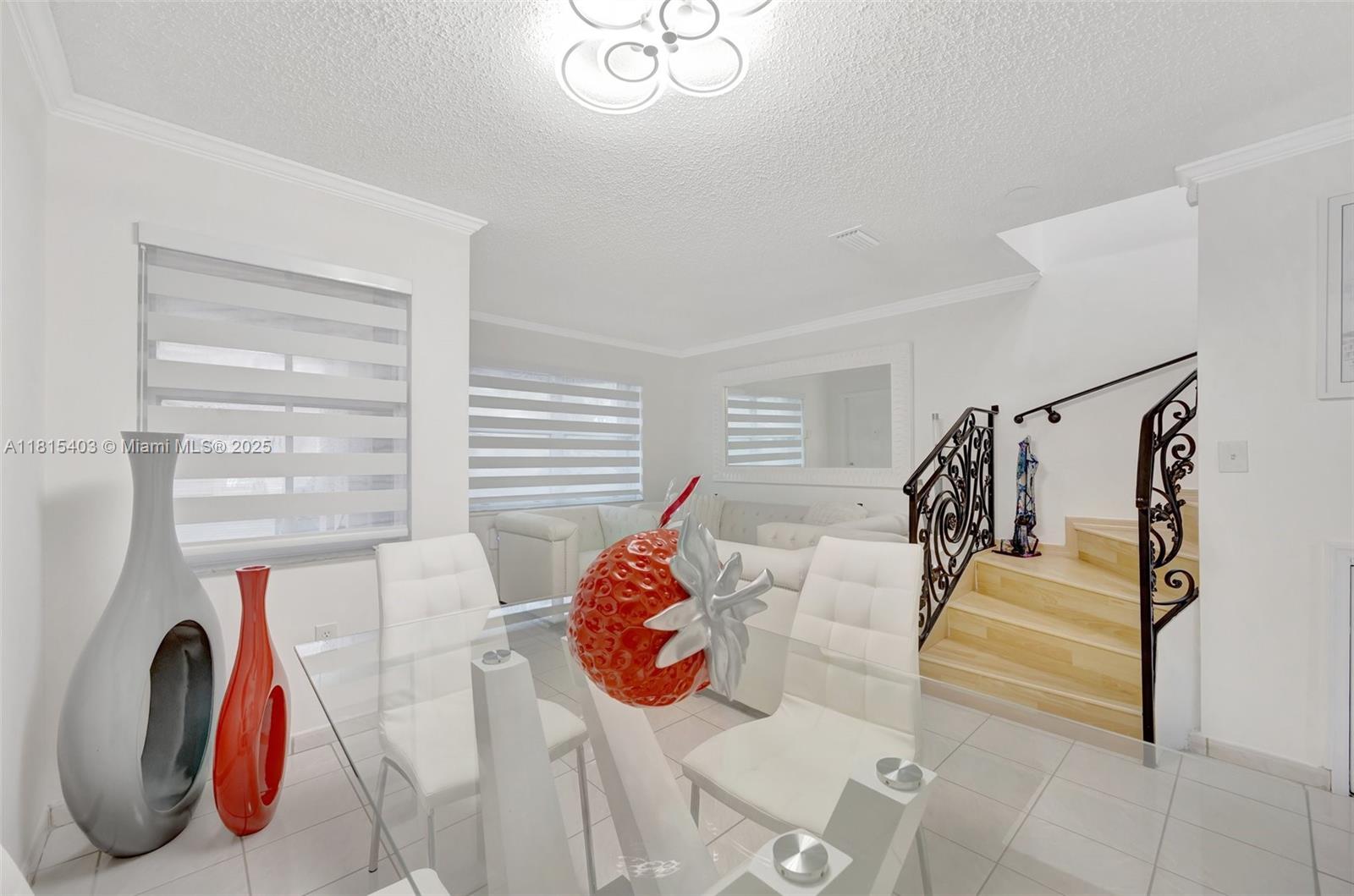 Gorgeous 2/2.1 townhome has been impeccably maintained and tastefully renovated. Step into a bright and open floor plan featuring high ceilings, two spacious bedrooms with open walk-in closets. Custom light fixtures throughout the home in addition to Bluetooth features in bathrooms, new stainless steel appliances in kitchen and new washer and dryer. Zebra blinds throughout the house in addition to a newly installed pergola in patio.Two assigned parking spaces and plenty guest parking.