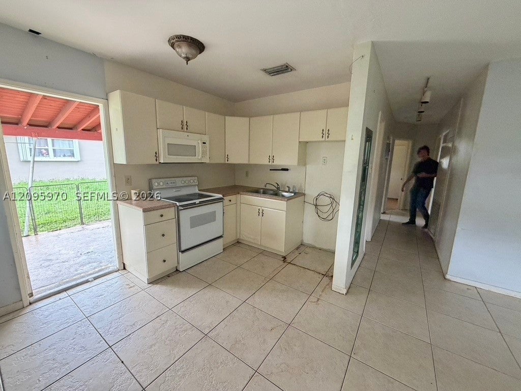 Photo of 6115 SW 2nd St, Margate, FL 33068 (MLS # A12095970)