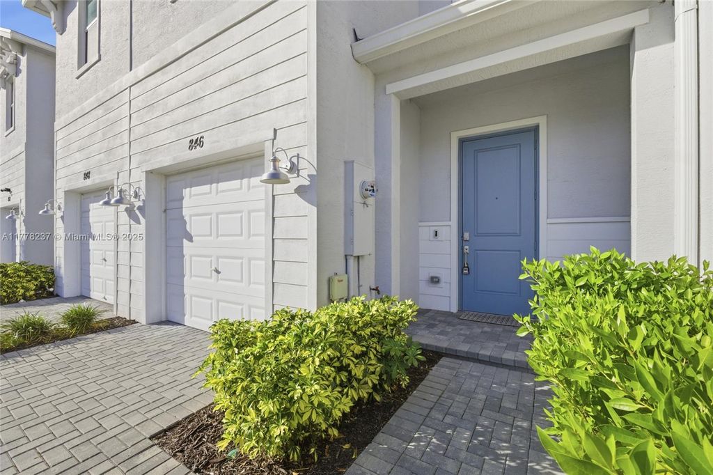 Photo of 846 SE Grovebush Ln, Port St Lucie, FL 34984 (MLS # A11778237)