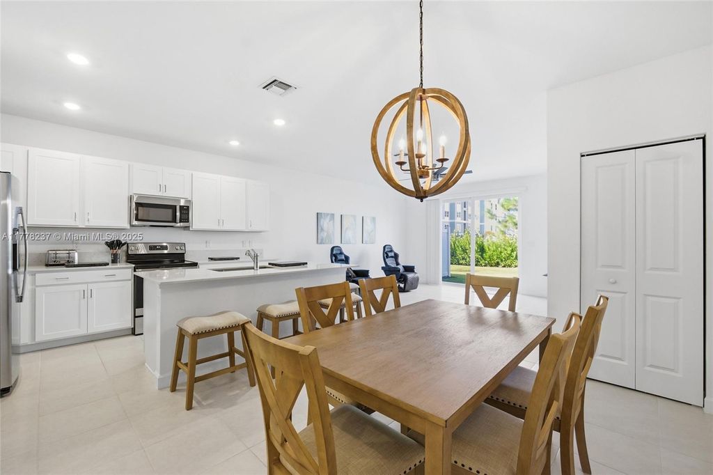 Photo of 846 SE Grovebush Ln, Port St Lucie, FL 34984 (MLS # A11778237)