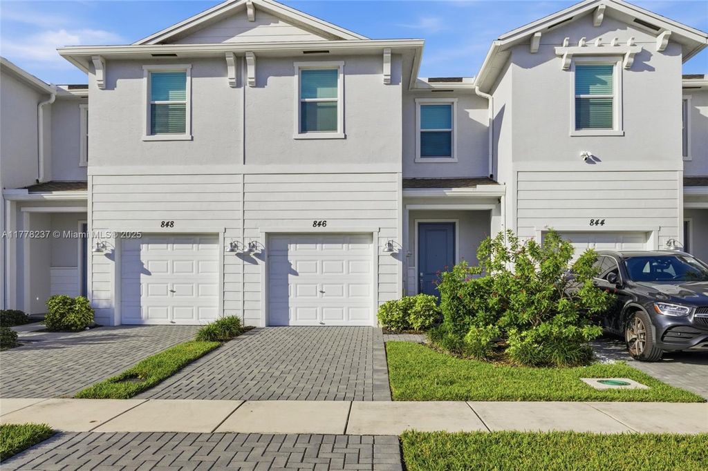 Photo of 846 SE Grovebush Ln, Port St Lucie, FL 34984 (MLS # A11778237)