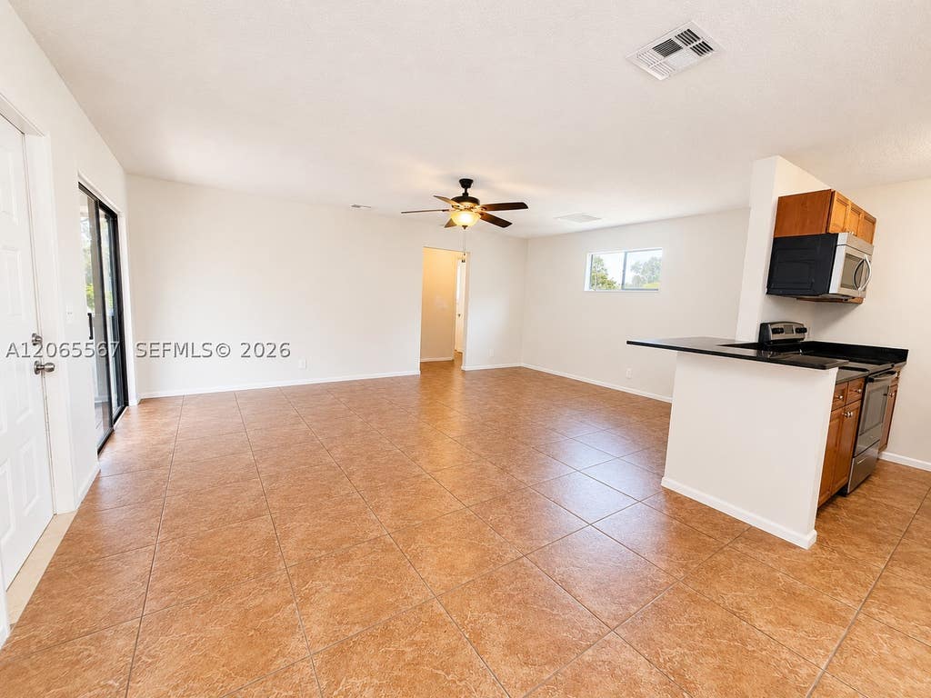Photo of 28 Crossings Cir #E, Boynton Beach, FL 33435 (MLS # A12065567)