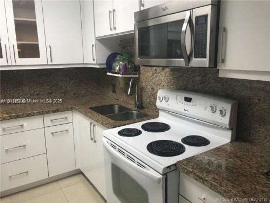 ***Location! Location! Location!!!!!!!!!***  Spacious and beautifully remodeled 2-bedroom convertible, used as 3 bedrooms and featuring 2 full bathrooms. The den has been enclosed to create a comfortable third bedroom with its own private shower. Nice floor, kitchen and bath. Lots of closet space. 
 Ensenada Condominium, Located in the heart of Aventura on the famous Country Club Drive circle — minutes from the Aventura Mall, fine dining, and houses of worship. Enjoy the best lifestyle Aventura has to offer with great amenities. enjoy the view from your nice balcony.  Don’t miss this opportunity — come see it today!