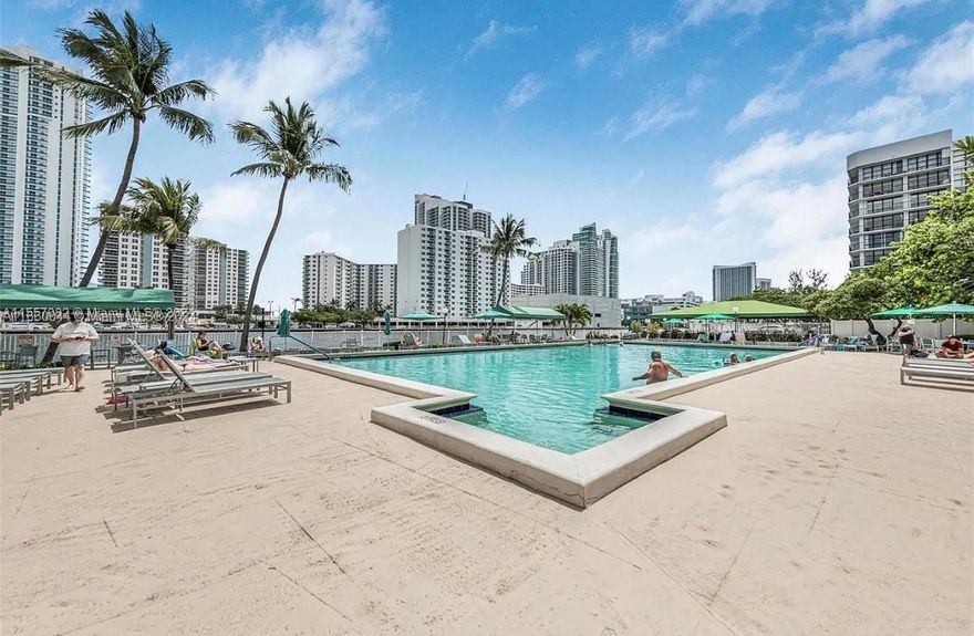 Floor to ceiling windows in this spacious 1 bedroom and 1 1/2 bath unit with den situated on the Intracoastal. . Pergo and tiled throughout. Stainless steel appliances. Walk-in closet. 40 year certification complete. Association with reserves. Wii-fi and hot water included in maintenance. Building has 24/7 attended lobby security, social activities, heated swimming pool, state-of-the-art gym, sauna, tennis, BBQ area, billiard, table tennis, bicycle storage and full-time management. Less than 2 miles to the beach, close to Hollywood Boardwalk, Aventura Mall, shopping, casinos, restaurants, race tracks, Brightline, marinas, golf course and Ft. Lauderdale Airport.