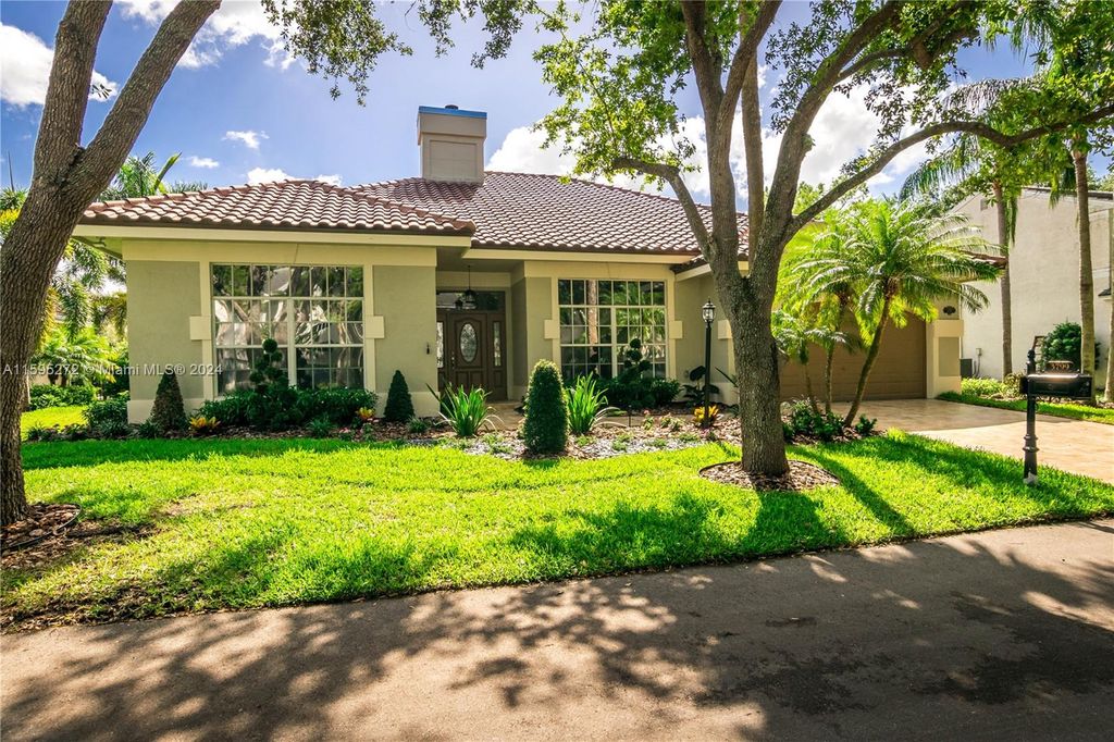 Photo of 3799 Lancewood Dr, Coral Springs, FL 33065 (MLS # A11595272)