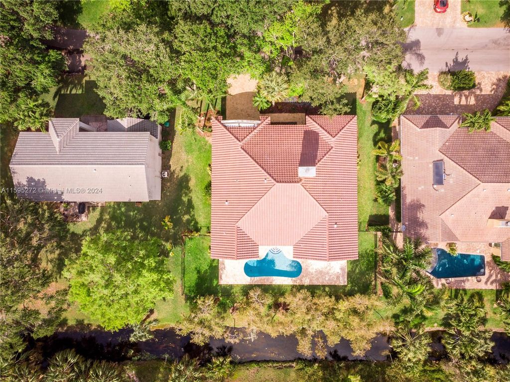 Photo of 3799 Lancewood Dr, Coral Springs, FL 33065 (MLS # A11595272)