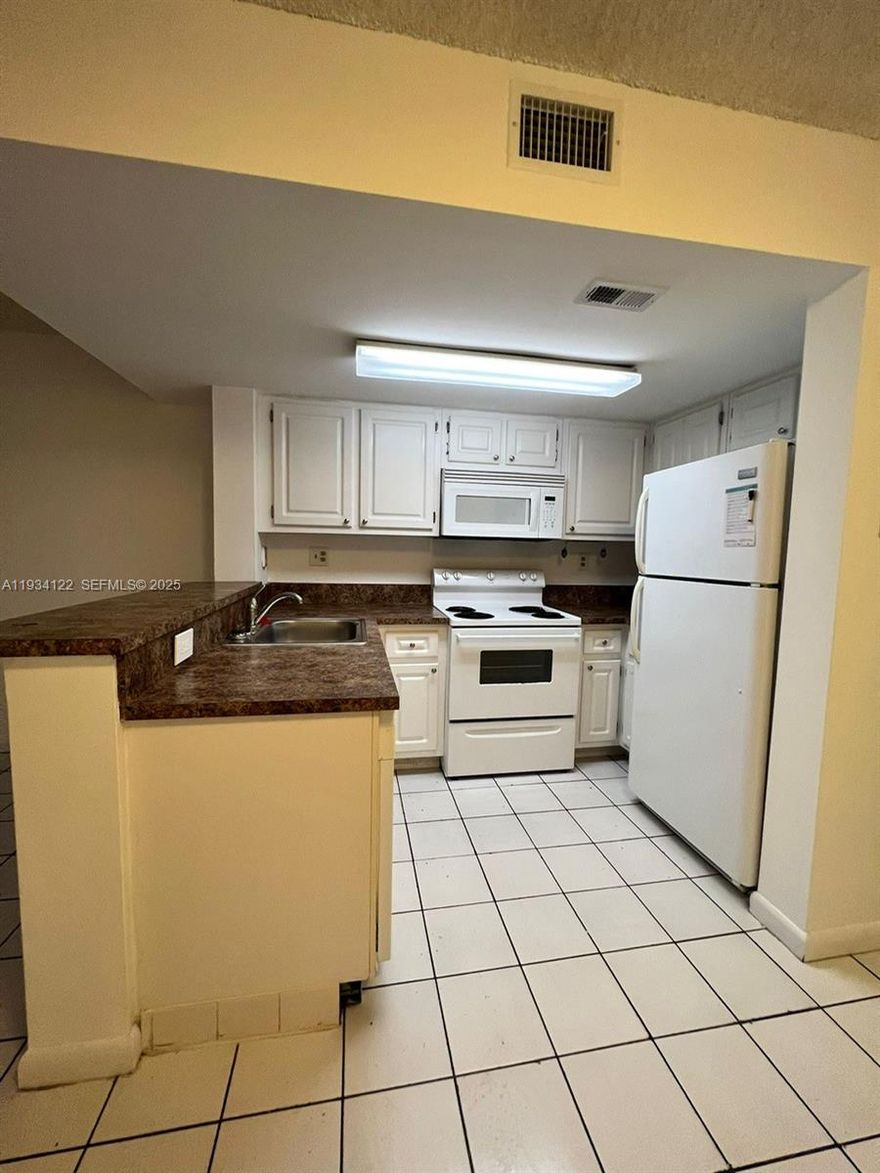 Spacious unit in convenient location near highways and shopping.  Laundry located inside unit.