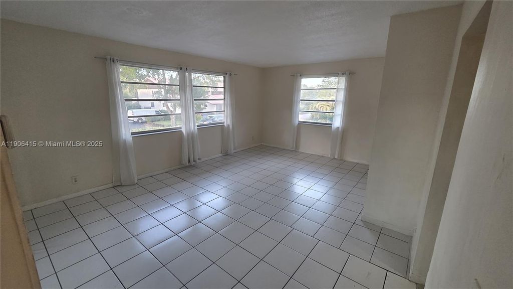 Photo of 8704 NW 35th St #201, Coral Springs, FL 33065 (MLS # A11906415)