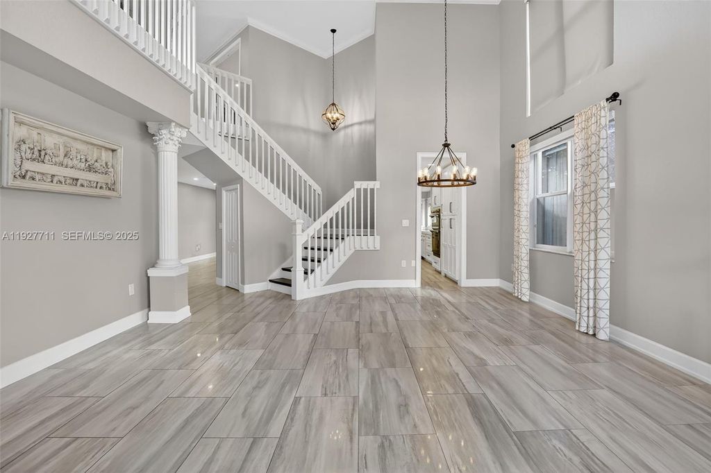 Photo of 1911 NW 169th Ave, Pembroke Pines, FL 33028 (MLS # A11927711)