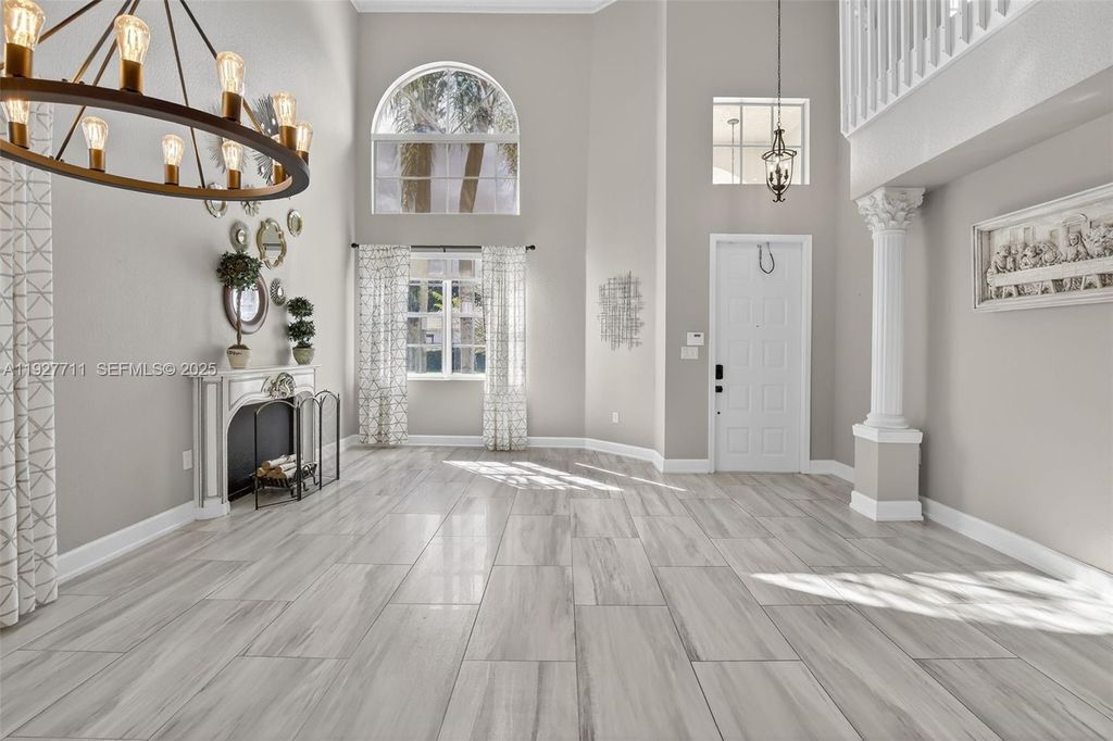 Photo of 1911 NW 169th Ave, Pembroke Pines, FL 33028 (MLS # A11927711)