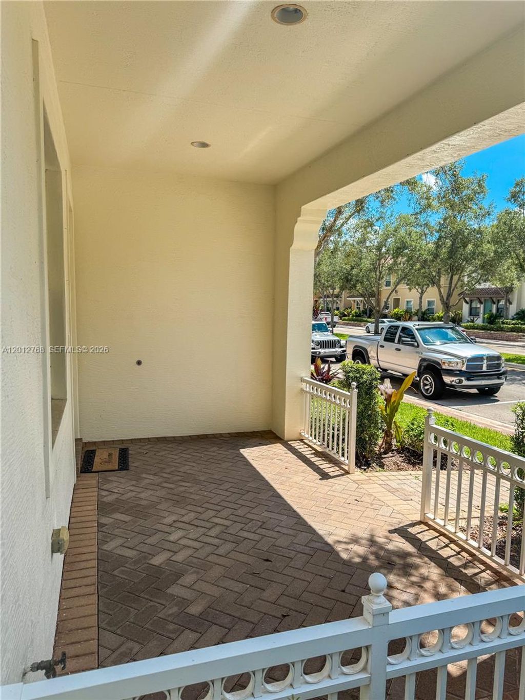 Photo of 3210 NW 126th Avenue #3210, Sunrise, FL 33323 (MLS # A12012768)