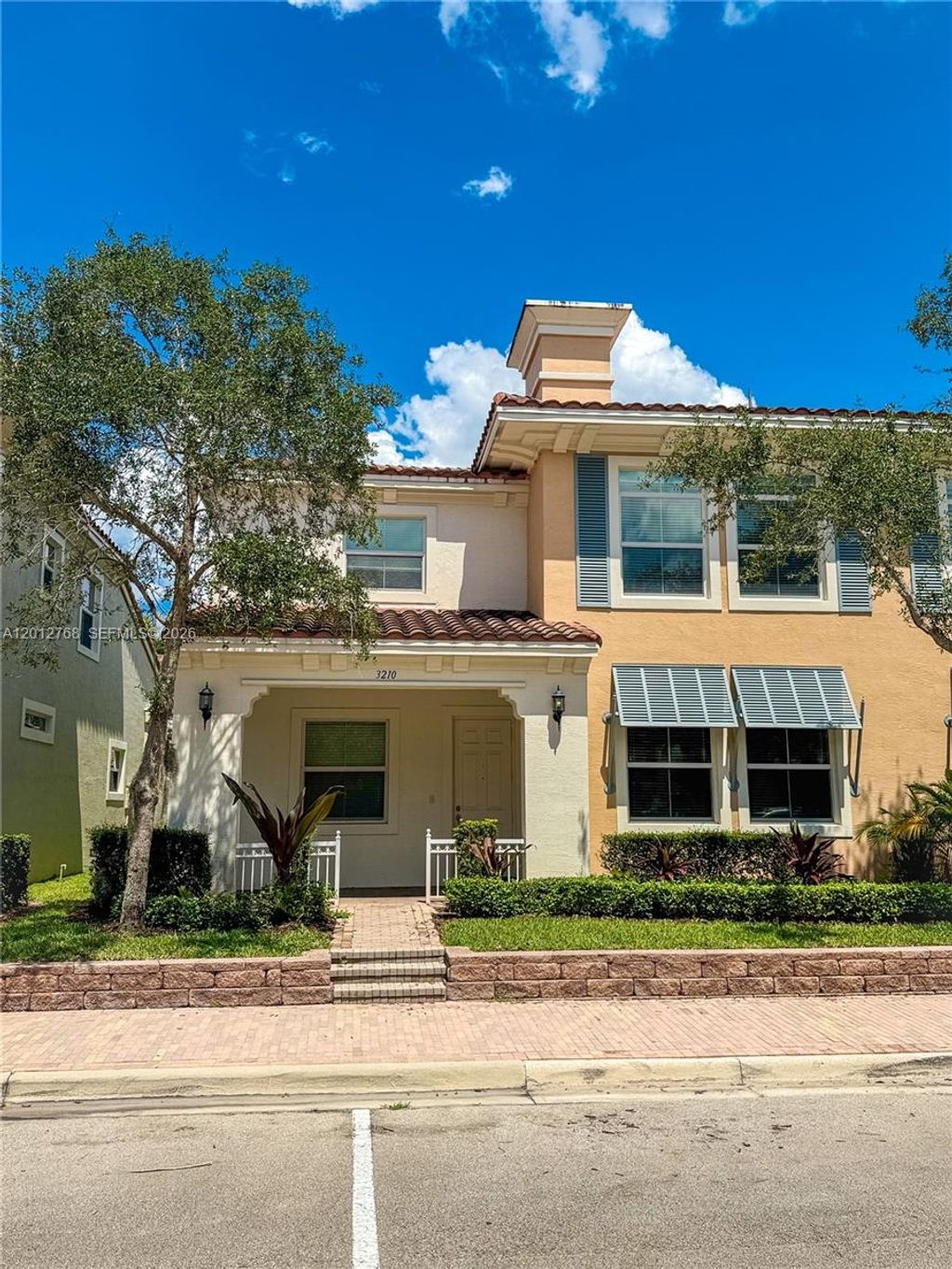 Photo of 3210 NW 126th Avenue #3210, Sunrise, FL 33323 (MLS # A12012768)