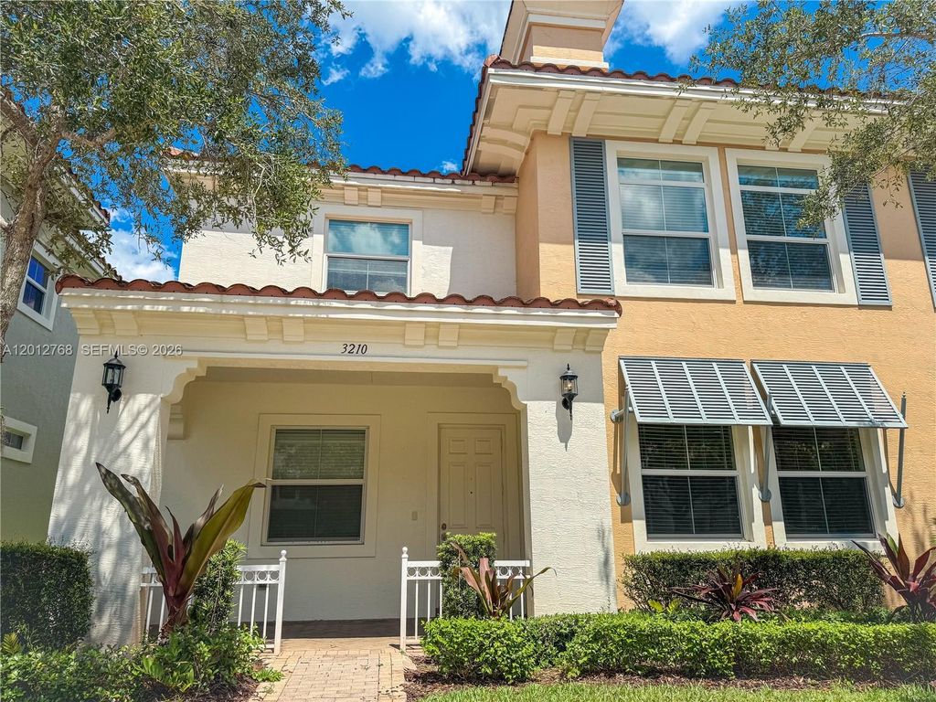 Photo of 3210 NW 126th Avenue #3210, Sunrise, FL 33323 (MLS # A12012768)