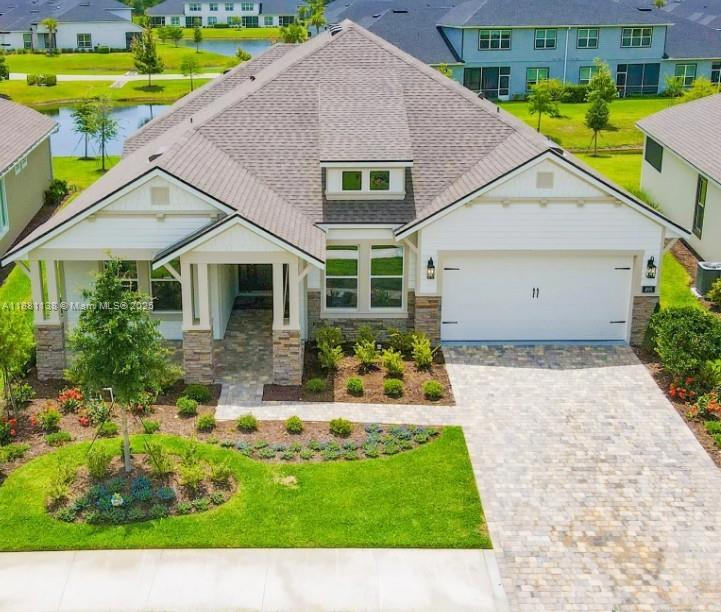 Brand-new construction in a gated golf community with top amenities and a state-of-the-art clubhouse! The Davenport offers nearly 2,600 sq ft with 4 bedrooms and 3 bathrooms. The open floor plan combines the kitchen, dining, and gathering room into one spacious area. A covered lanai extends from the living and dining rooms. Three bedrooms and two baths are at the front; the master suite is at the rear with a large walk-in closet, split vanities, and a spacious shower. Features include a deluxe kitchen, extended lanai, 12' ceilings, future summer kitchen plumbing, designer finishes, and HBW Home Warranty.