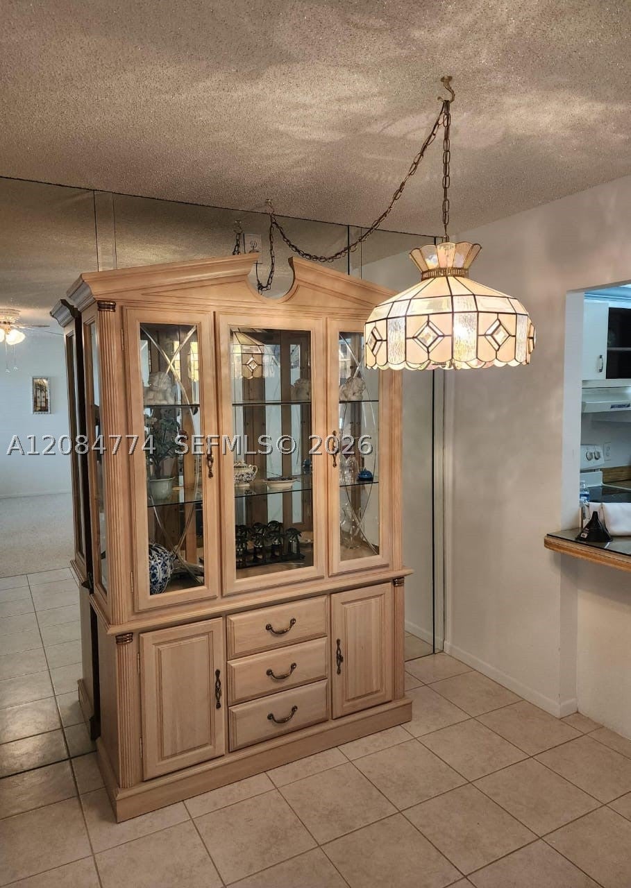 Photo of 3561 Pine Tree Ct #D-2, Green Acres, FL 33463 (MLS # A12084774)