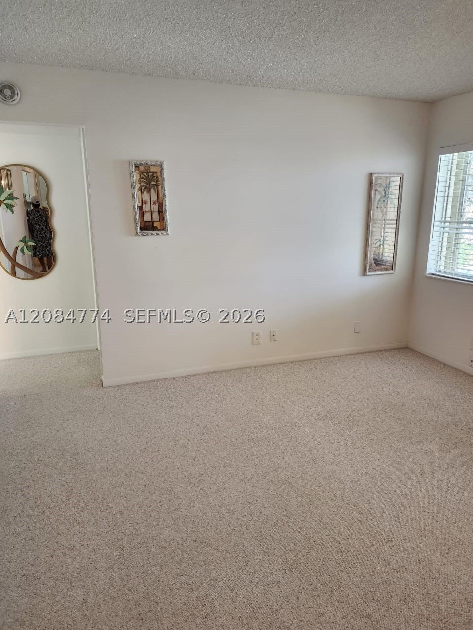 Photo of 3561 Pine Tree Ct #D-2, Green Acres, FL 33463 (MLS # A12084774)