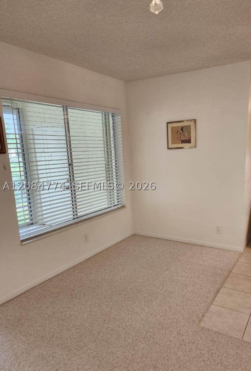 Photo of 3561 Pine Tree Ct #D-2, Green Acres, FL 33463 (MLS # A12084774)