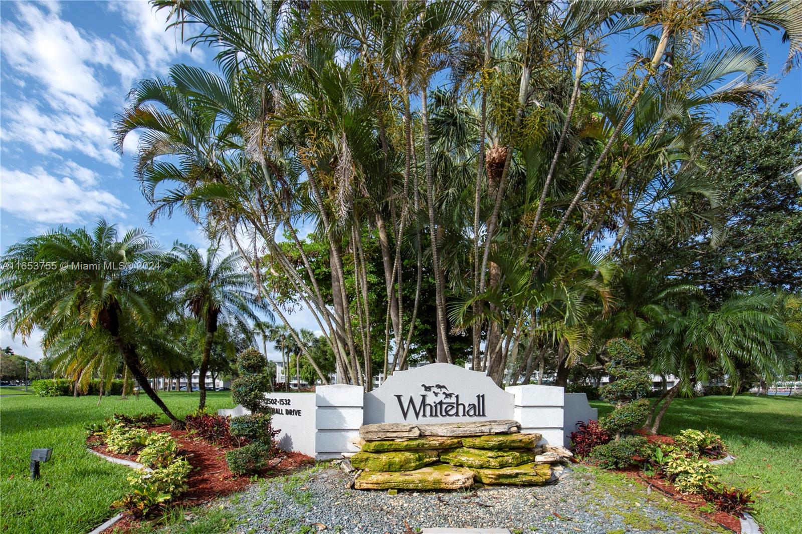 Welcome to this TOTALLY REMODELED condo located in an all-age community of Pine Island Ridge! This exceptional 2 bedroom plus additional room (has its own entrance with door off living room), offers a versatile living space perfect for an office or 3rd room. 2nd floor corner unit is meticulously upgraded & unit has impact windows. Enjoy the convenience of a full-size washer and dryer. The bright, open floor plan is enhanced by built-in bookshelves that are included with the home. Centrally located, this condo provides easy access to major highways, top-rated schools, & is within walking distance to a shopping center, country club, and community pool. The Pine Island Ridge Country Club offers an array of amenities including two restaurants, golf, tennis, a gym, and more!