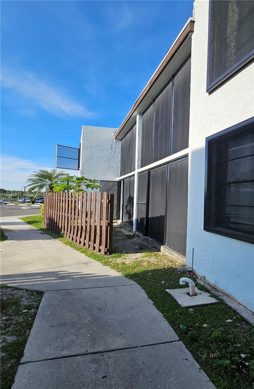 Investor’s special! Spacious 2-bedroom, 2-bath condo located in a well-maintained gated community in the heart of Oakland Park. Currently rented at $1,900/month to excellent tenants, making this a solid income-producing property from day one. Private fenced patio, washer and dryer inside the unit.  The association does not require buyer approval and offers no rental restrictions, all ages welcome, and no waiting period to rent after closing, providing maximum flexibility for investors.  The community has recently undergone major capital improvements, including new roofs throughout the entire complex, resurfaced parking lots, new lighting in common areas, freshly painted building exteriors, and fully restored amenities. Gated entrance and professionally managed HOA. Prime location with easy access to major roads, shopping, dining, schools, and public transportation, just minutes from Fort Lauderdale, Wilton Manors, and major employment centers.  A rare opportunity to own a turn-key rental in a high-demand area. ***AGENTS SEE BROKER REMARKS***