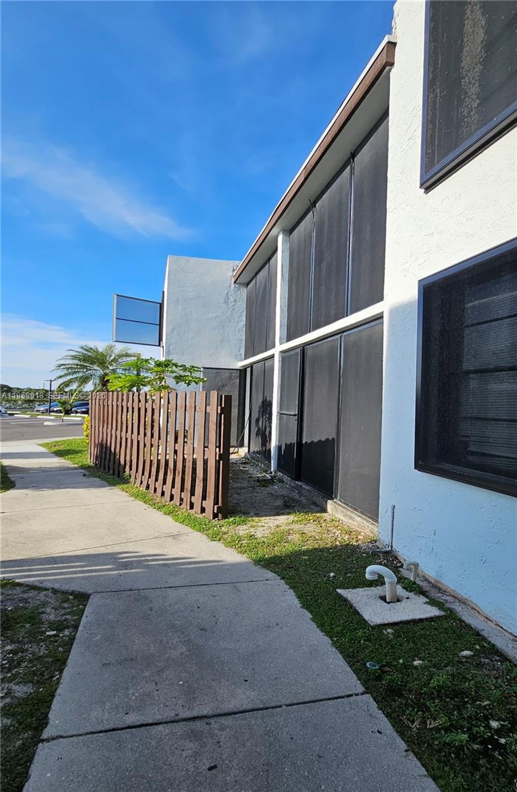 Photo of 211 Lake Pointe Dr #102, Oakland Park, FL 33309 (MLS # A11958918)