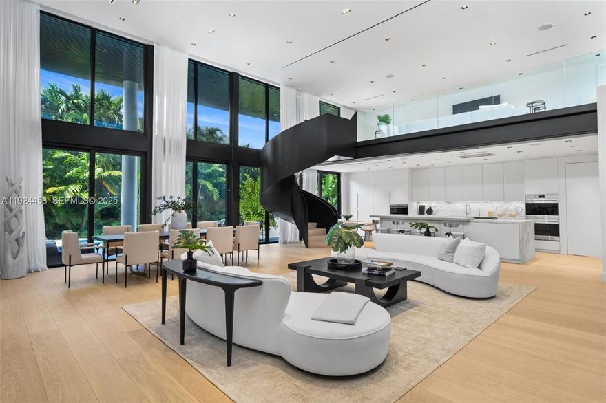 Discover this one-story modern masterpiece in the prestigious guard-gated community of Golden Beach. Set on an oversized 14,645 SF lot, this newly constructed residence offers 6 bedrooms, 9 bathrooms, and 5,457 SF of refined living space. A dramatic 21-foot entry foyer, Italian kitchen, built-out closets, and white oak floors elevate the design. Expansive glass walls fill the home with natural light and connect to the lush outdoors. Enjoy a resort-style pool, summer kitchen, covered terrace, and al fresco dining. Additional features include smart-home technology, a full-house generator, high-end finishes and electric vehicle charging outlets in the garage. Located in one of South Florida’s most exclusive seaside neighborhoods, Golden Beach offers private beach access, tennis courts, playgrounds, and a close-knit sense of community.