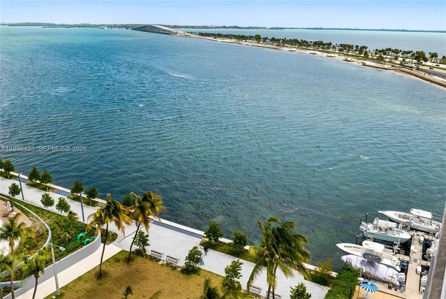 Experience true waterfront living in this boutique building featuring a private marina and stunning pool overlooking Biscayne Bay. Perfectly positioned near Key Biscayne, Coconut Grove, and Downtown Miami, this location offers the best of both convenience and coastal charm. Residents enjoy an impressive lineup of amenities including a bayside swimming pool, community dock with boat lifts, fitness center, sauna, barbecue areas, and 24-hour front desk security. The building is well maintained, creating a comfortable and inviting atmosphere. Start your mornings on your private balcony, taking in tranquil bay views and fresh ocean breezes. The unit also includes one assigned parking space for added ease. A rare opportunity to enjoy marina-front living in one of Miami’s most desirable areas.