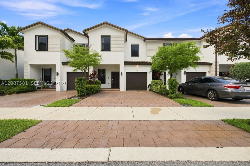 Photo of 156 SW 185th Way, Pembroke Pines, FL 33029 (MLS # A12087581)