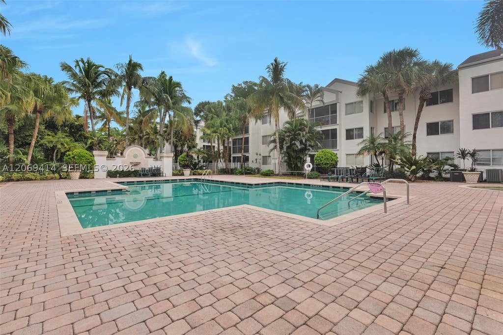 Photo of 5760 Rock Island Rd #339, Tamarac, FL 33319 (MLS # A12069414)