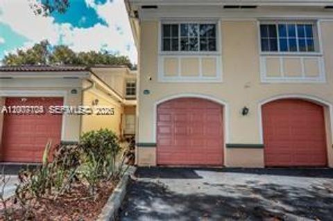 Photo of 2500 Centergate Dr #104, Miramar, FL 33025 (MLS # A12007704)