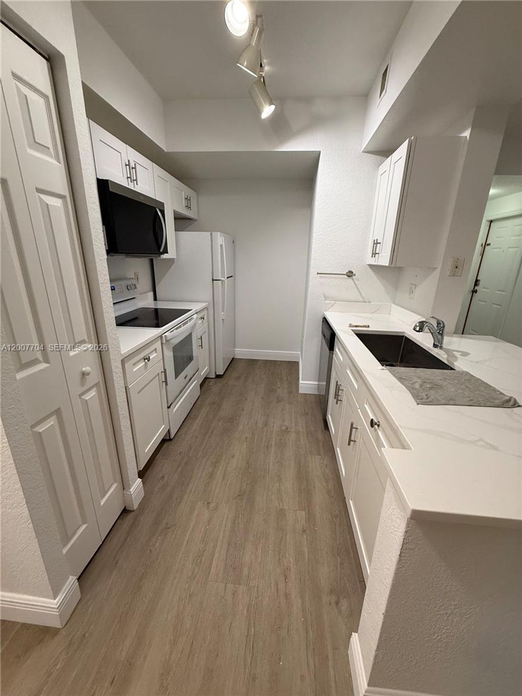 Photo of 2500 Centergate Dr #104, Miramar, FL 33025 (MLS # A12007704)