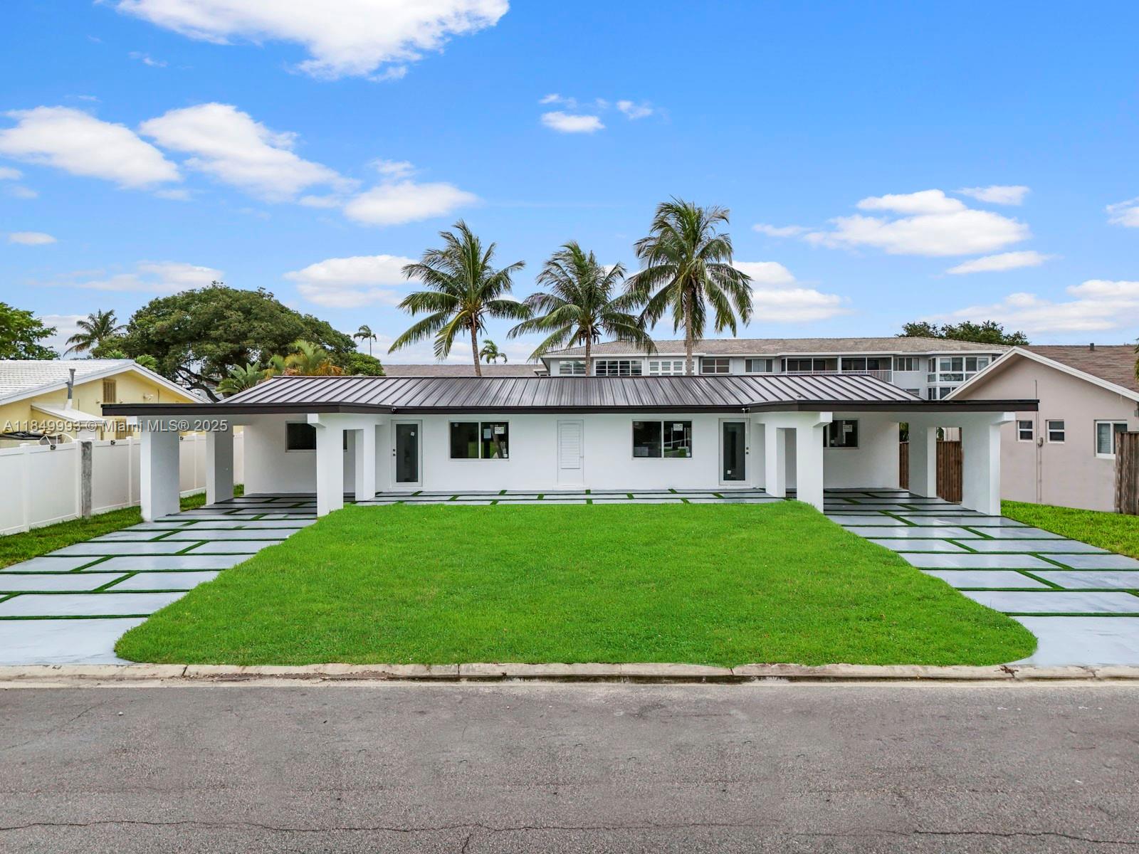 Experience exceptional coastal living with this one-of-a-kind waterfront duplex, offering a 3/2 and 1/1 split on 75 feet of prime water frontage with no fixed bridges. Meticulously reimagined from top to bottom, this complete spec rehab features brand-new electrical and plumbing systems, new impact windows and doors, a new aluminum roof, and new A/C units—delivering peace of mind and modern efficiency. Light-filled interiors and thoughtful upgrades create a seamless blend of style, comfort, and functionality, all in a location that embraces the best of South Florida’s boating lifestyle. Whether you plan to live in it or add it to your portfolio, this home delivers.