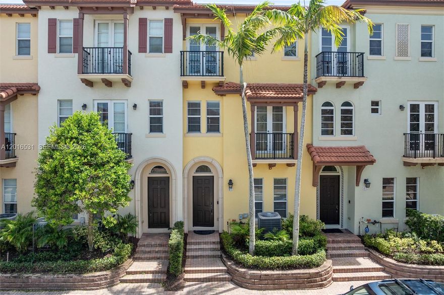 Beautifully renovated luxury townhome in a private gated Boca Raton community. This immaculate residence features a flexible first-floor bedroom and full bath, soaring ceilings, abundant natural light, and an expansive main living level with elegant flooring. The designer kitchen offers high-end finishes, stainless steel appliances, and a spacious breakfast bar overlooking the family room—ideal for entertaining. The upper level showcases a large primary suite with a well-appointed bath, while multiple balconies enhance the indoor-outdoor lifestyle. Additional highlights include impact windows and doors, a private in-home elevator, and a two-car garage with ample storage. Ideally located near the community pool, parks, shopping, dining, and major highways.