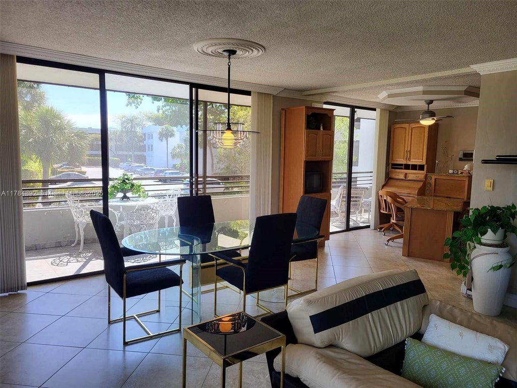 Photo of 1460 Sheridan St #11D, Hollywood, FL 33020 (MLS # A11784892)