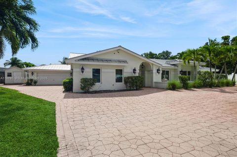 Photo of 6700 NW 28th Ter, Fort Lauderdale, FL 33309 (MLS # A11879179)
