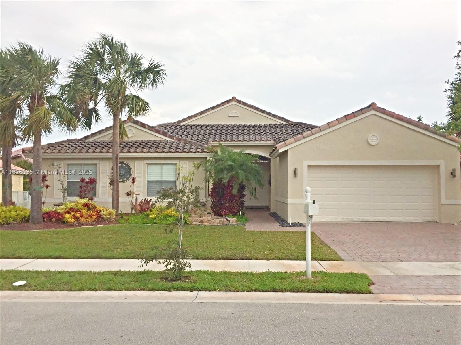 Superb 4 BR, 2 bath home in manned-gated Encantada Community in western Pembroke Pines. Remodeled kitchen w/ granite countertops. Spacious design w/ xtra work/study area, high ceilings, separate living room presenting many options. Well equipped walk-in closets, dual sinks, separate shower/tub in master suite. 2009 A/C, water heater. Resort-level community amenities incl clubhouse, pool, gym, basketball, volleyball, tennis, tot lot, more. Great location, very close to top grade A schools incl Sunset Lakes Elem, Pembroke Pines Charter West Elem and Middle, Franklin Academy and Montessori Academy, close to shopping, dining, parks, incl nationally recognized soccer program/complex. 4th BR is currently configured as Den/Office. Close to I-75 and HWY 27 for easy commutes in every direction.