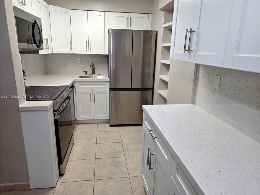 Beautifully updated 1/1 condo on the first floor of the community of Casa Granada.  Unit is freshly painted and kitchen has been totally updated with new white shaker cabinets, new top of the line stainless steel appliances, and beautiful white quartz countertops, unit also features very nice updated bathroom, modern lighting fixtures and ceramic tile floors throughout. I has a very spacious screened in patio great for entertainment and relaxing. Casa Granada offers a nice and spacious laundry facility just a few steps away. Pets allowed if its a service animal.