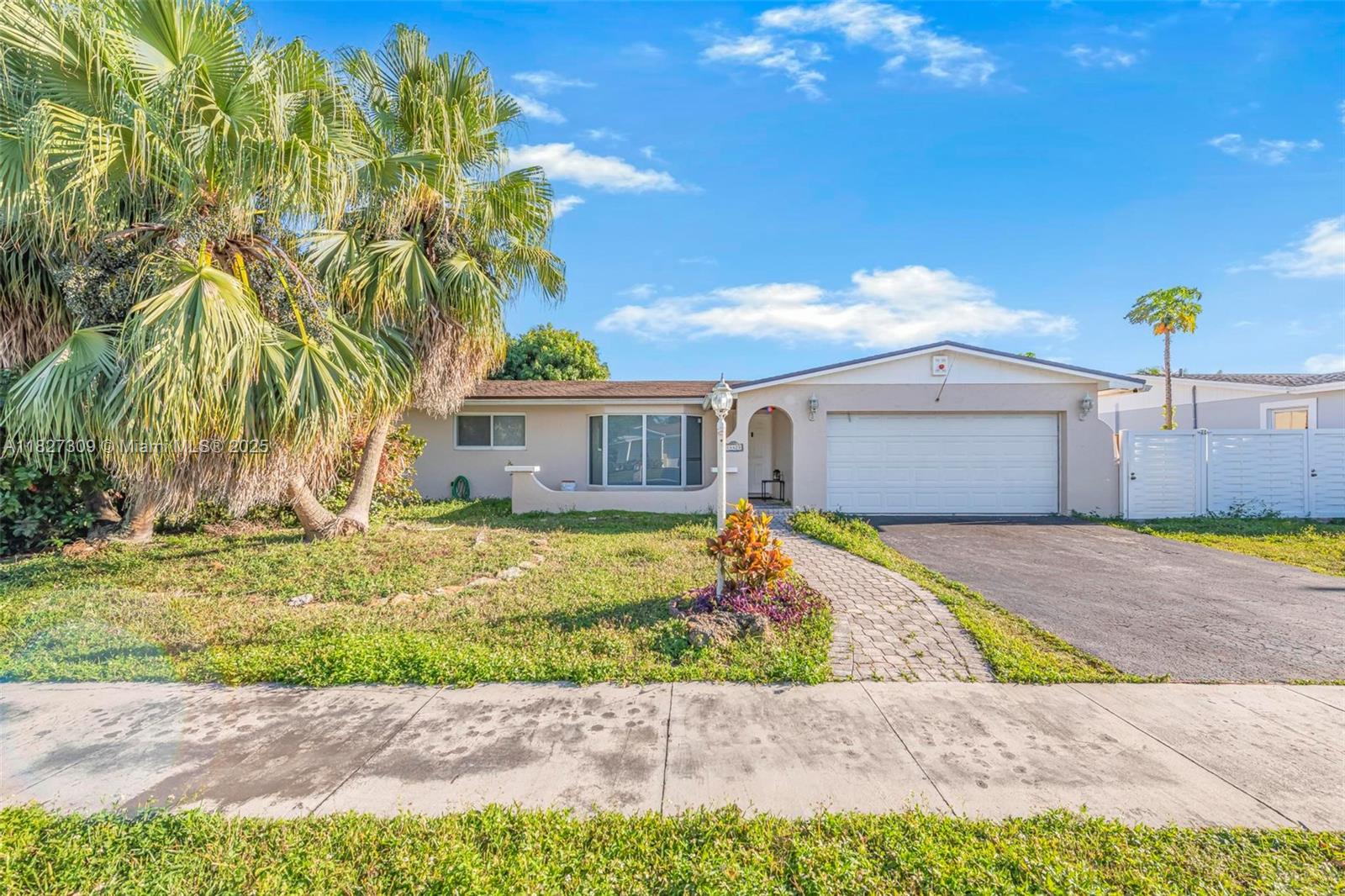 Spacious and serene 3-bedroom, 2-bath lakefront home for sale in the heart of Kendall! This well-maintained residence features a tiled interior, impact windows, and a large covered terrace—perfect for relaxing or entertaining with breathtaking lake views. Enjoy a generous backyard and your own private tiki hut dock, creating the ultimate outdoor retreat. The possibilities are endless with this home !