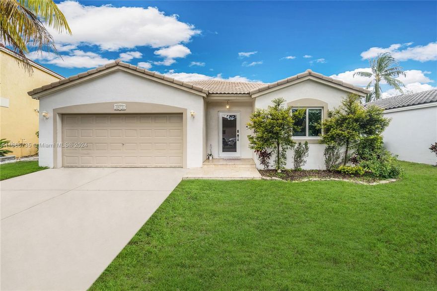 Stunning 4-Bedroom Home in Gated Avalon Community!  This beautifully designed 4-bedroom, 2-bathroom residence has vaulted ceilings and an a spacious layout, perfect for entertaining. Step outside to a large outdoor patio, ideal for summer barbecues, and a gorgeous swimming pool. Impact windows and doors for added safety and a convenient 2-car garage. Located just minutes from shopping, dining, and top-rated schools, this property offers a tranquil lifestyle in a secure community. Schedule your showing today!