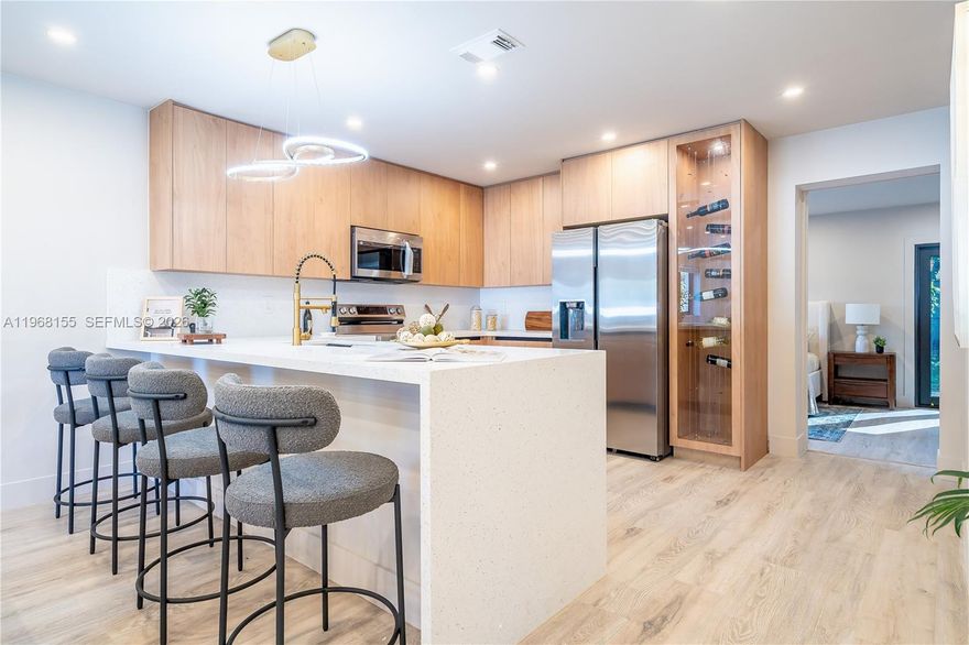 Completely renovated and move-in ready home featuring a brand-new roof and modern upgrades throughout. Designed for both comfort and functionality, this beautifully updated property offers bright living spaces and contemporary finishes. Step outside to a spacious backyard with plenty of room to build a pool and create your own outdoor oasis (see rendering). The flexible layout also offers potential for a private living area that could provide additional income or accommodate extended family. Buyer to verify all uses and improvements.