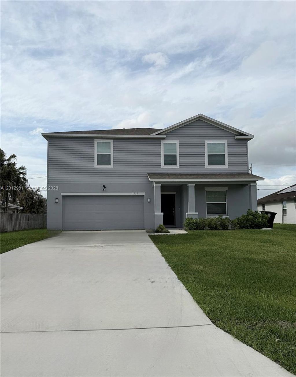 Photo of 1557 SW Dycus Ave, Port St Lucie, FL 34953 (MLS # A12012981)