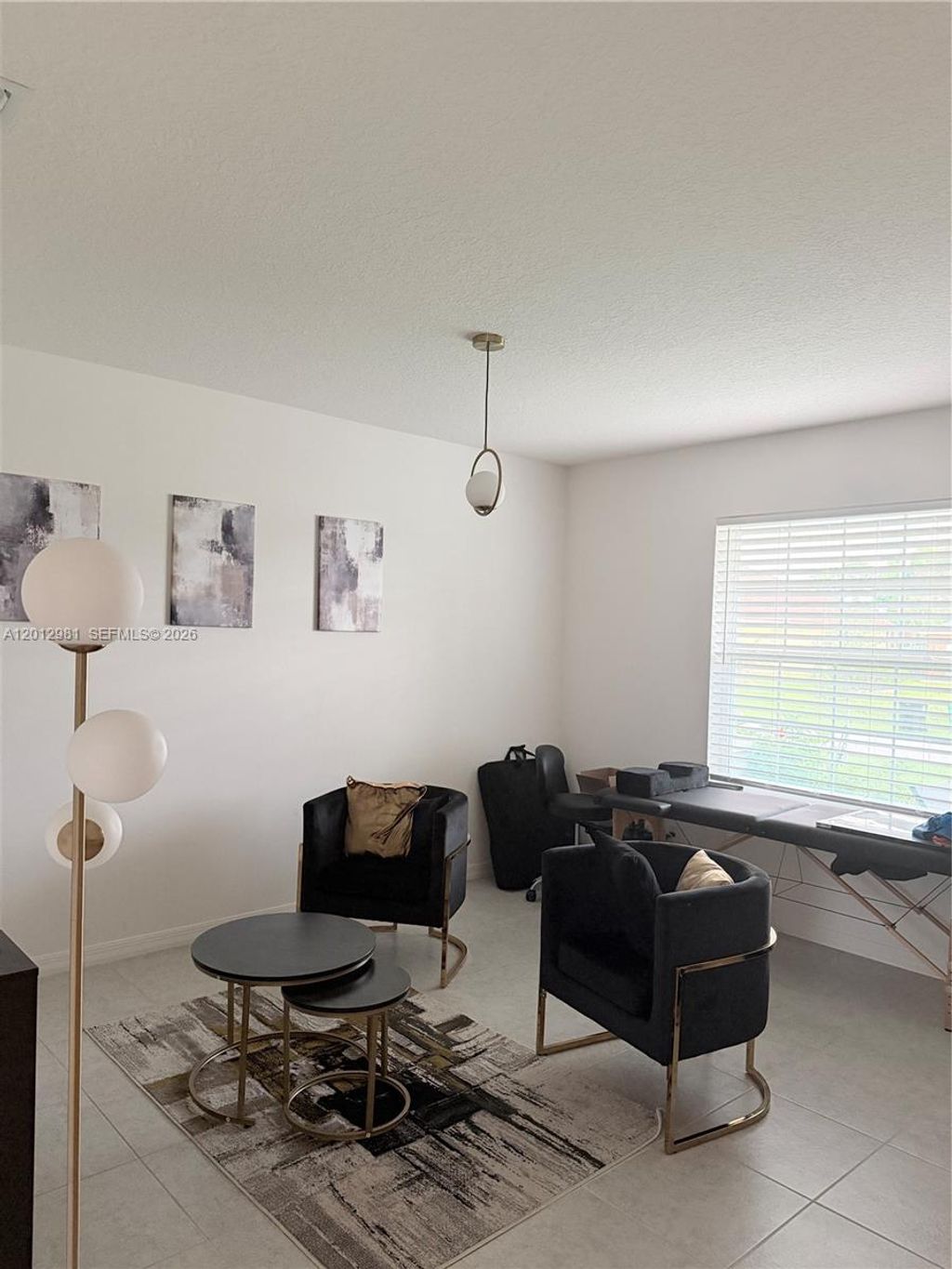 Photo of 1557 SW Dycus Ave, Port St Lucie, FL 34953 (MLS # A12012981)