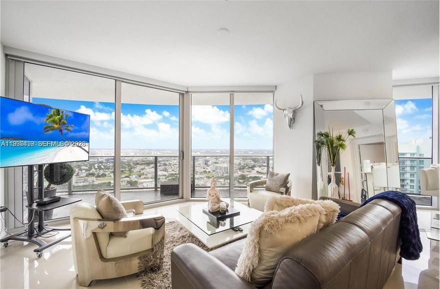 Nestled in the vibrant Edgewater Arts & Entertainment District, Aria on the Bay is a striking 53-story waterfront tower with spectacular panoramic views of Biscayne Bay, Miami Beach, and the downtown skyline. This stunning 2-bedroom, 2.5-bath corner residence at Aria on the Bay, one of Miami’s most sought-after luxury high-rises. This exceptional unit features a large balcony with breathtaking ocean and city views — perfect for entertaining or simply enjoying the Florida lifestyle. Inside, the spacious kitchen boasts quartz countertops, high-end stainless steel Bosch appliances. The open-concept living and dining areas are flooded with natural light from floor-to-ceiling impact windows, and 9-foot ceilings elevate the sense of space and sophistication. The residence includes one assigned parking space.