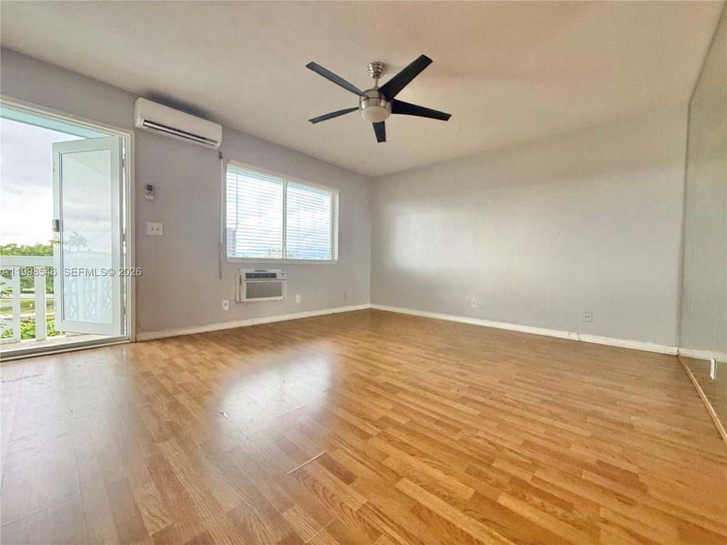 Photo of 455 Golden Isles Dr #309, Hallandale Beach, FL 33009 (MLS # A11998546)