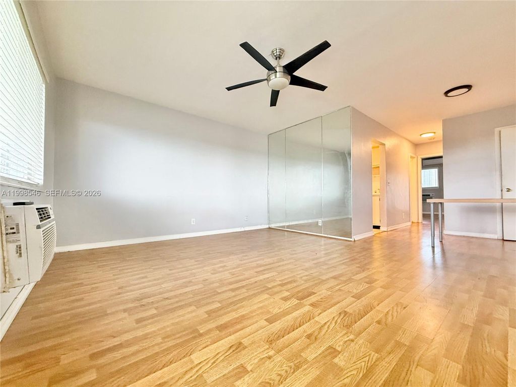 Photo of 455 Golden Isles Dr #309, Hallandale Beach, FL 33009 (MLS # A11998546)