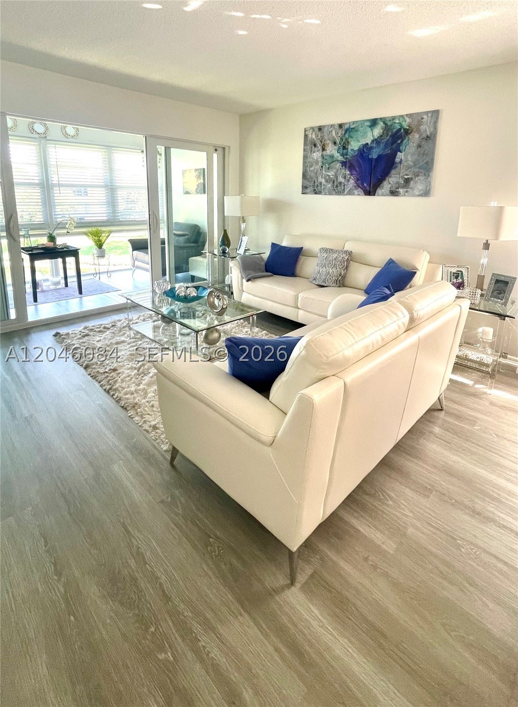 Photo of 5980 NW 64th Ave #312, Tamarac, FL 33319 (MLS # A12046084)