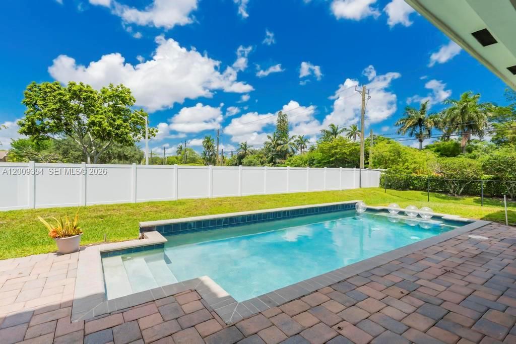 Photo of 7601 Cavalia Dr, Davie, FL 33328 (MLS # A12009354)