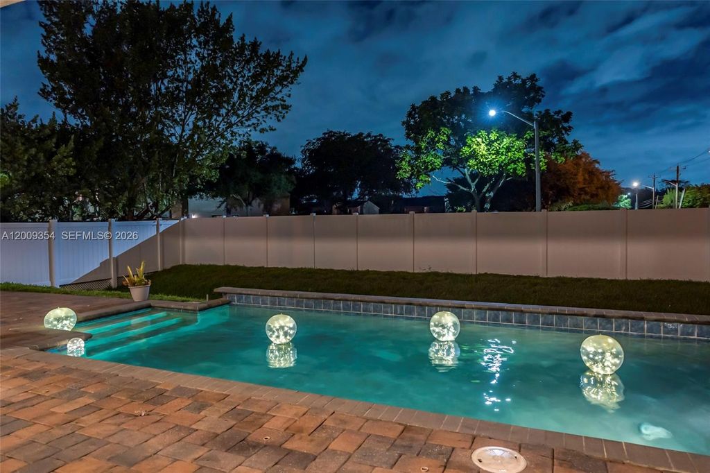Photo of 7601 Cavalia Dr, Davie, FL 33328 (MLS # A12009354)