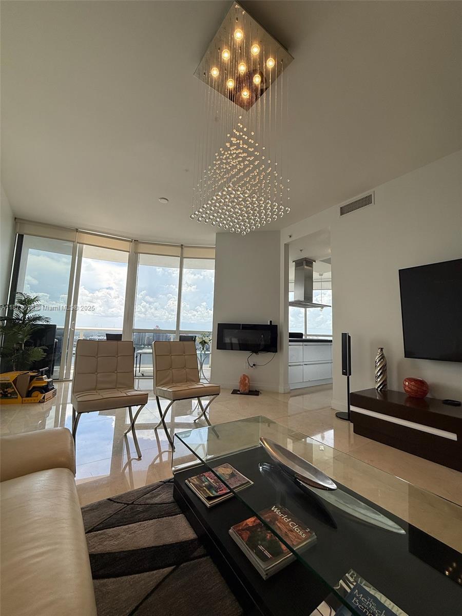Experience Luxury living in this tastefully furnished 2 bed, 2 bath residence at Trump Royale in Sunny Isles Beach. Enjoy private elevator access, 10 ft ceilings and floor to ceiling windows with breath taking ocean and intracoastal views. The italian-designed kitchen features custom wood cabinetry, granite countertops and Miele appliances. Relax on 1,000 feet of private beachfront or enjoy three pools, a spa, fitness center, tennis courts and 24/7 valet and security. Seasonal 6 month rental lease!