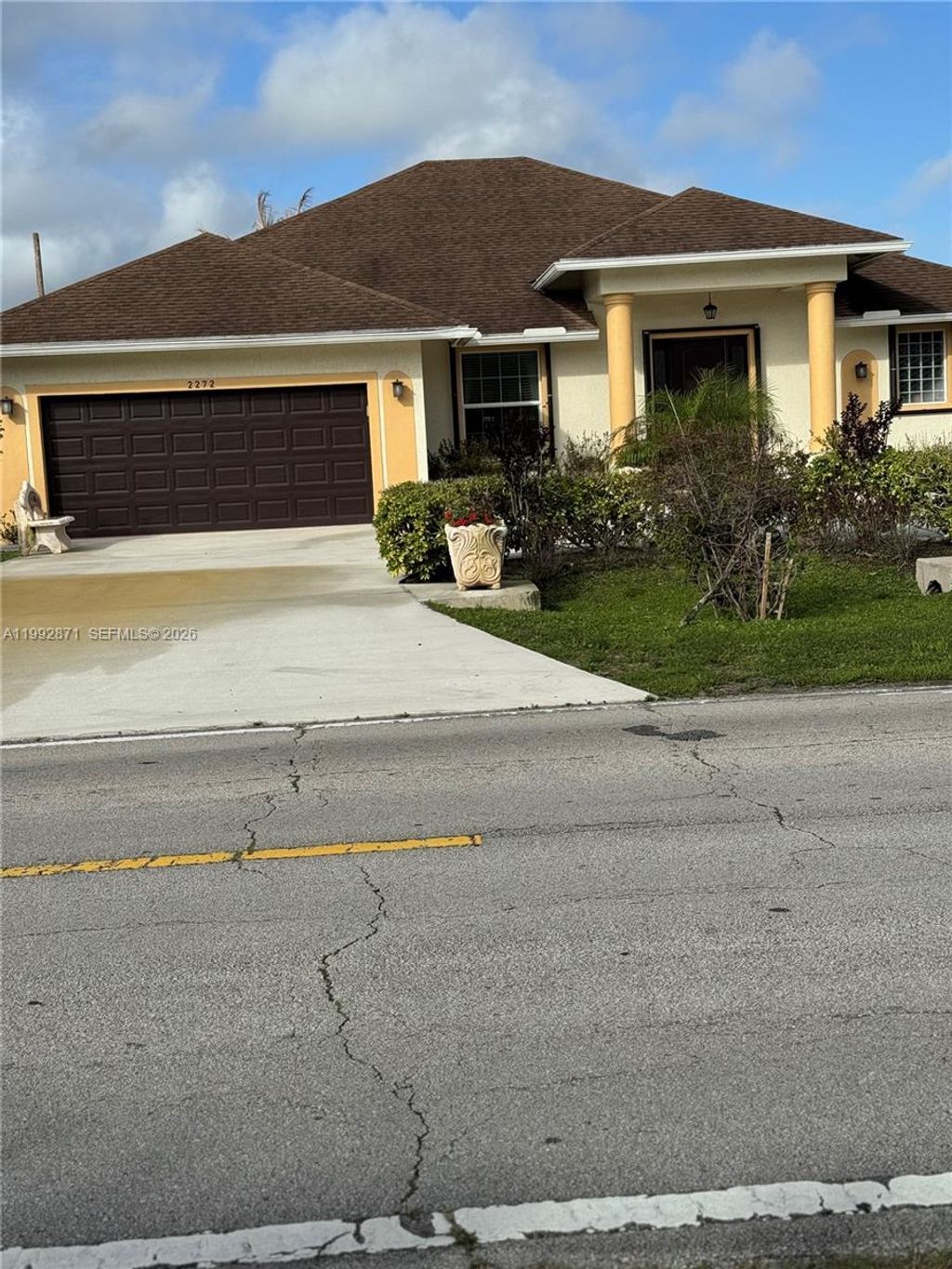 Photo of 2272 SW Cameo Blvd, Port St Lucie, FL 34953 (MLS # A11992871)